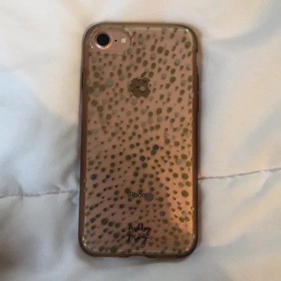 Rose Gold IPhone 7 with case. Had a slight chip on bottom.